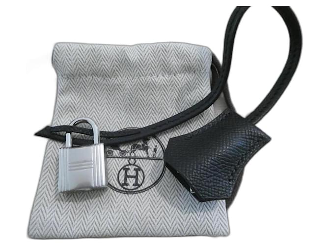 Hermès campanella, tirante per lucchetto Hermes nuovo per borsa Hermes dustbag Nero Pelle  ref.1282488