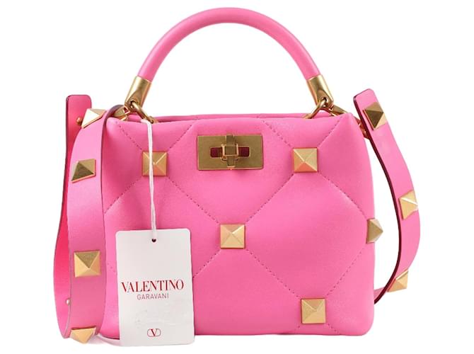 Valentino Garavani Borsa con manico superiore Valentino in pelle trapuntata rosa con borchia romana piccola  ref.1283821