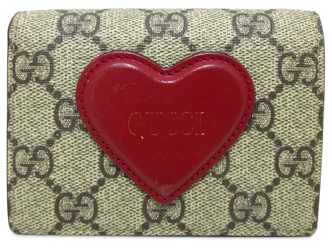 Braune Gucci GG Supreme-Geldbörse mit Herz-Faltschließe Leinwand  ref.1290800
