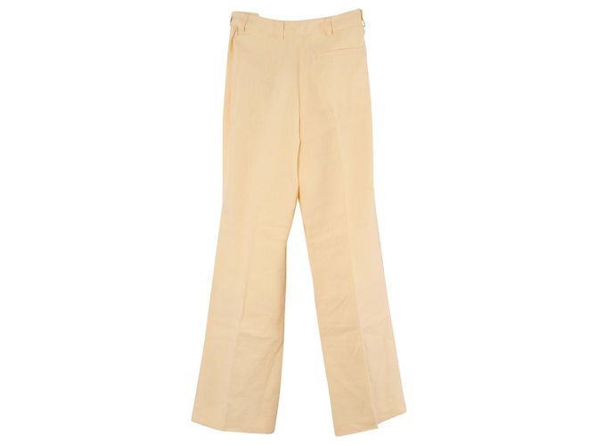 Pantalones con cierre lateral de lino amarillo de Acne Studios