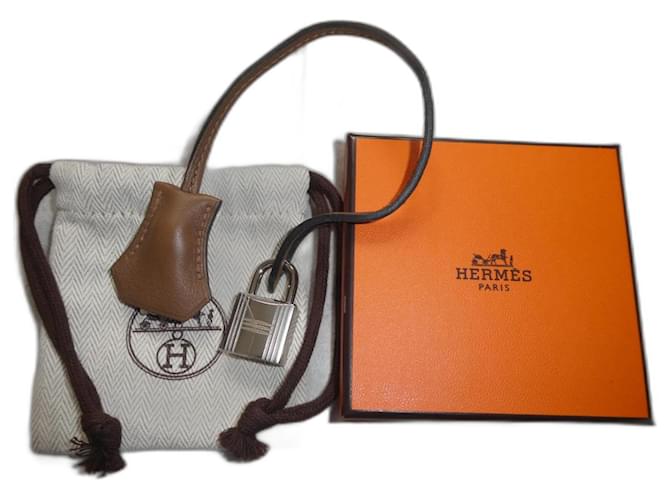 bell, pull tab, and new Hermès lock for Hermès bag, box and dustbag Light brown Leather  ref.1294140