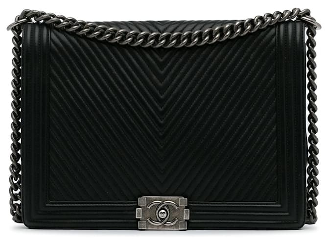 Bolso bandolera con solapa Chanel XL Chevron Boy negro Cuero  ref.1297188
