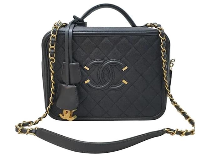 Estuche de tocador de filigrana de Chanel, bolso acolchado de caviar en tono dorado. Negro Cuero  ref.1297779