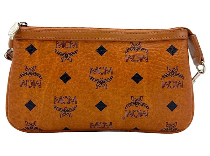Funda de estuche MCM Mini Bag, bolsa de cosméticos pequeña en color coñac con logo plateado.  ref.1297984