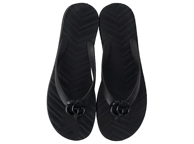 Sandalias planas de dedo con logo GG Pascar de Gucci en caucho negro Goma  ref.1301364