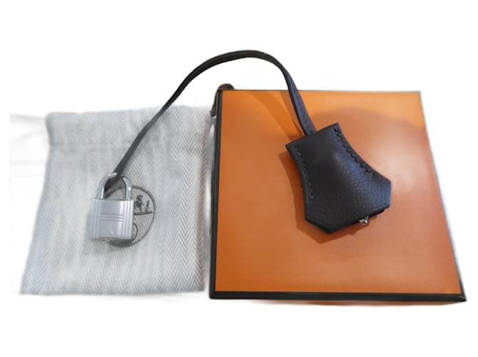 bell, pull tab, and new Hermès lock for Hermès bag, box and dustbag Leather  ref.1302101