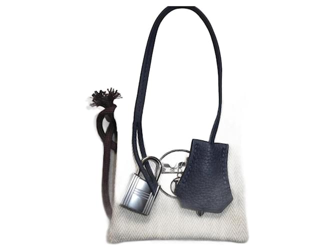 Hermès campanella, cerniera e lucchetto Hermes nuovi per borsa Hermes dustbag Blu Pelle  ref.1302218