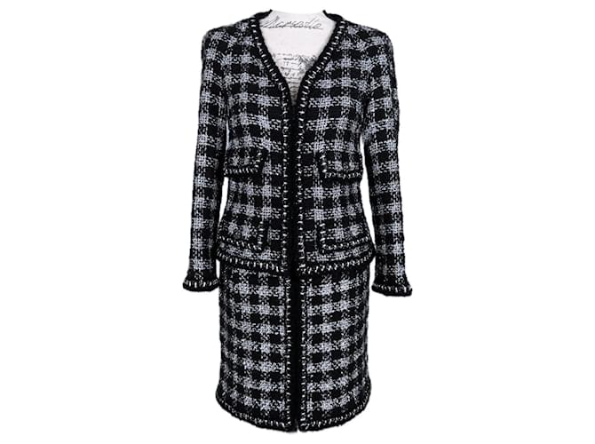 Chanel 12.000 dollari giacca e gonna in tweed nero con bottoni gioiello.  ref.1303022