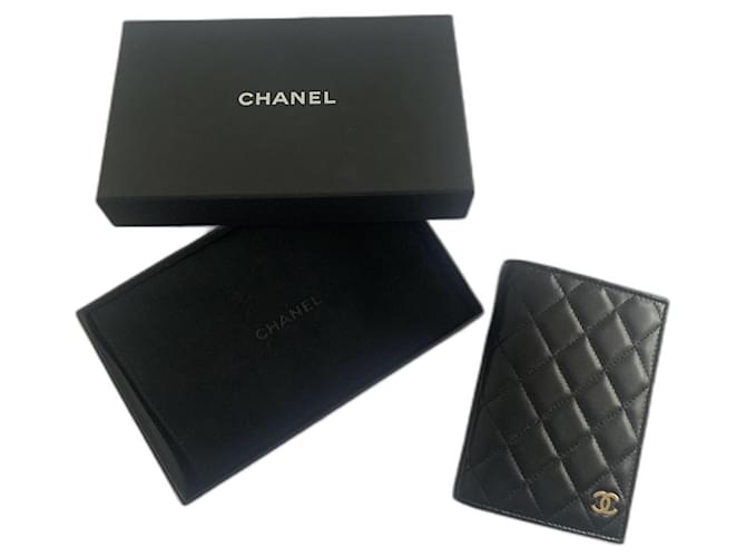 Chanel Clutch bags Preto Pele de cordeiro  ref.1303220