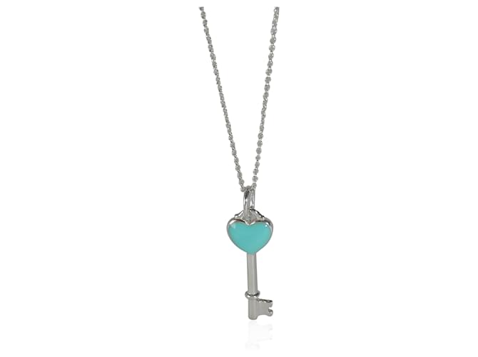TIFFANY & CO. Ciondolo con chiave smaltata a forma di cuore blu in argento sterling Metallico Metallo  ref.1305425