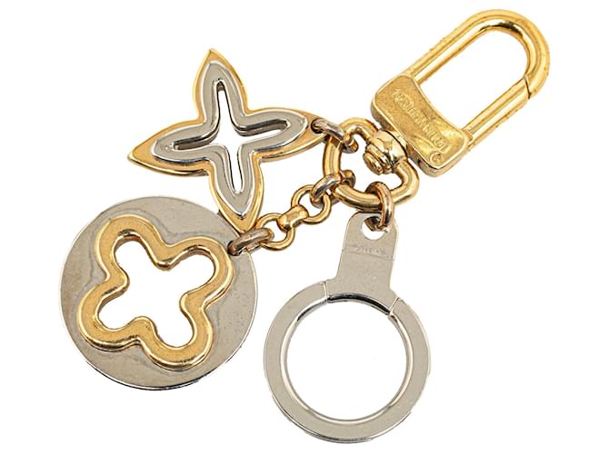 Porte-clés à breloque monogramme Louis Vuitton doré Or jaune  ref.1306370