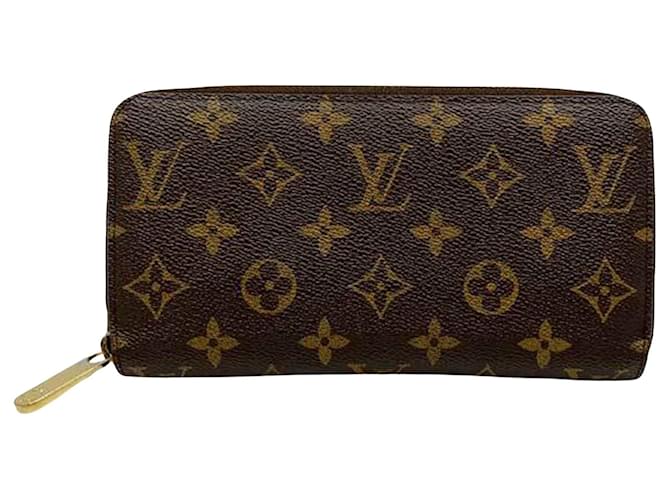 Louis Vuitton Portefeuille zippy Brown Cloth  ref.1307598