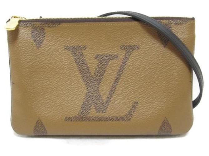 Louis Vuitton Monogram Giant Reverse Double Zip Pochette Brown  ref.1310609