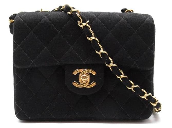 Chanel Mini sac carré à rabat en coton matelassé Noir  ref.1310652