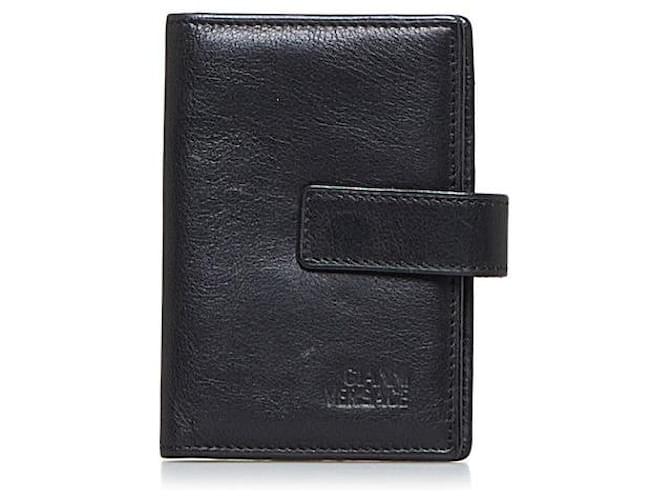 Versace Portefeuille porte-cartes en cuir Veau façon poulain Noir  ref.1311184