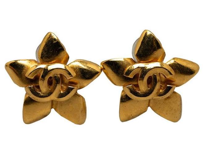 Chanel Boucles d'oreilles clip étoile CC Doré  ref.1311259
