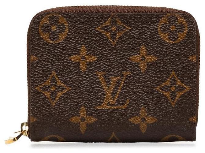 Louis Vuitton Portamonete con monogramma Zippy Marrone  ref.1311634
