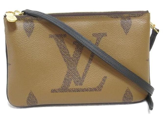 Louis Vuitton Pochette gigante con zip foderata al contrario con monogramma Marrone  ref.1312629