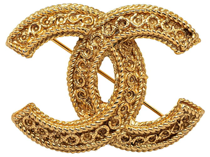 Broche Chanel CC Dourado Metal  ref.1313343