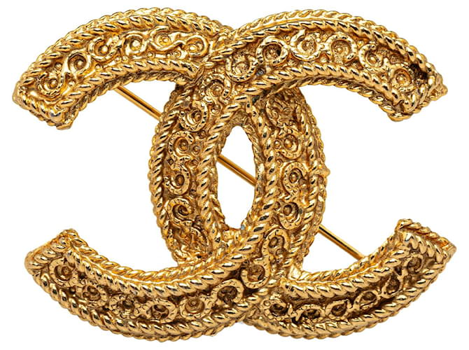Broche Chanel Gold CC Dourado Metal Banhado a ouro  ref.1314102