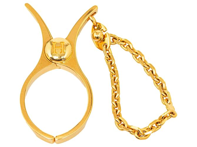 Hermès Porta guantes Hermes Gold Filou Dorado Metal Chapado en oro  ref.1314146
