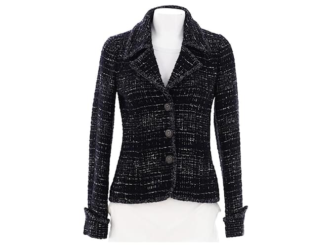 Chanel Veste en tweed noir avec boutons en CC à 9 000 $.  ref.1314264