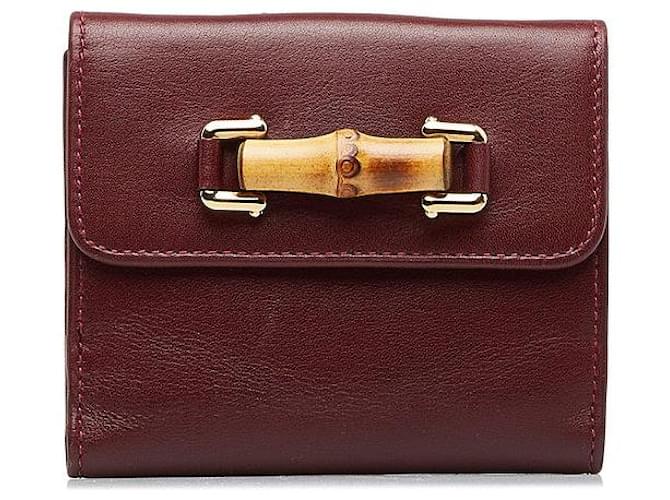 Gucci Portefeuille à deux volets en cuir et bambou Veau façon poulain Rouge  ref.1317599