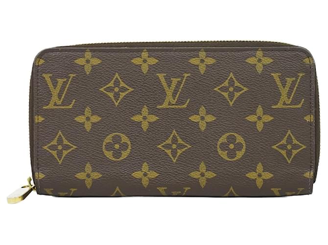 Louis Vuitton Portefeuille zippy Brown Cloth  ref.1320099