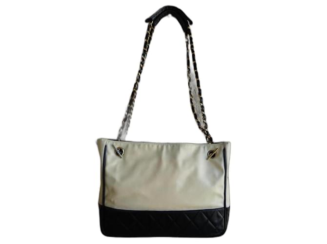 Chanel Handbags Black Eggshell Leather Cloth  ref.1320980