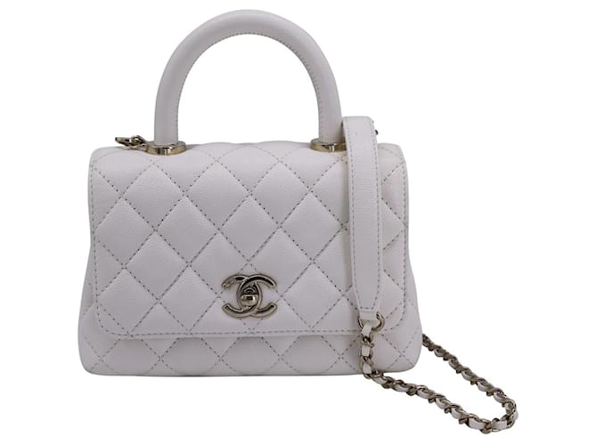 Timeless Chanel Coco Extra Mini Top Handle in White Caviar Leather Cream  ref.1324607