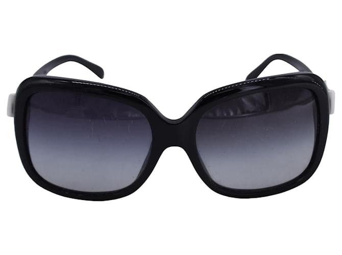 Gafas de sol cuadradas con detalle de lazo Chanel en plástico negro  ref.1325854