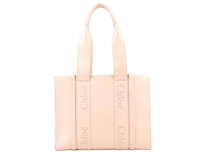 Chloé CHLOE Leather Calfskin Medium Woody Tote bag in Pink  ref.1326439