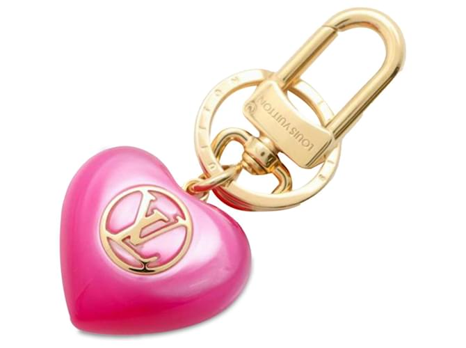 Porte-clés de la famille bien-aimée en or Louis Vuitton Métal Plastique Plaqué or Résine Rose Doré  ref.1328143