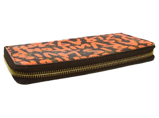 Louis Vuitton Zippy wallet Orange Cloth  ref.1329013