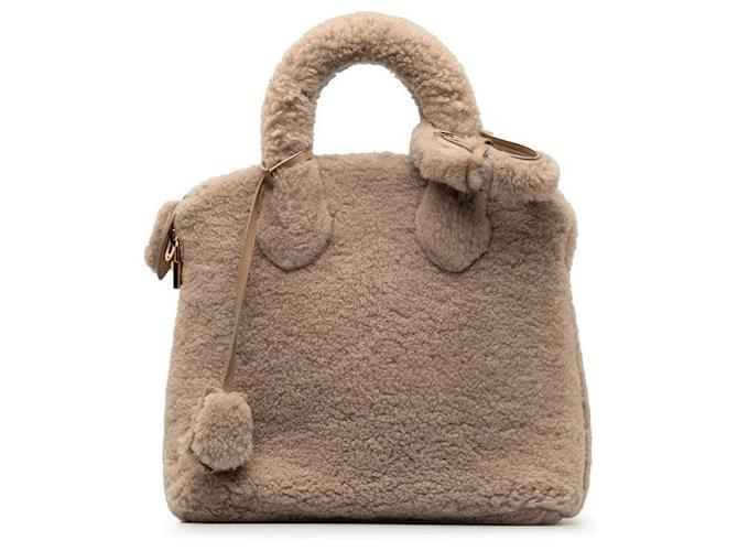 Louis Vuitton Lock It Voyage Canvas Handbag M93850 in good condition Cloth  ref.1333035