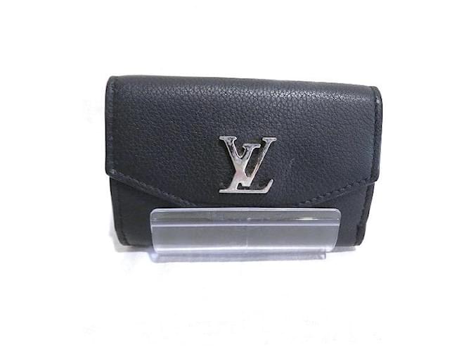 Louis Vuitton Portefeuille Lock Mini Leder Kurze Geldbörse M63921 in guter Kondition  ref.1335471