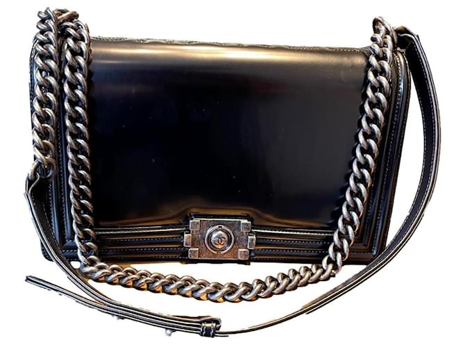 Boy Chanel Garçon Black Leather  ref.1335763