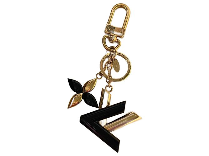 Louis Vuitton Charm per borsa a forma di twist nero Gold hardware