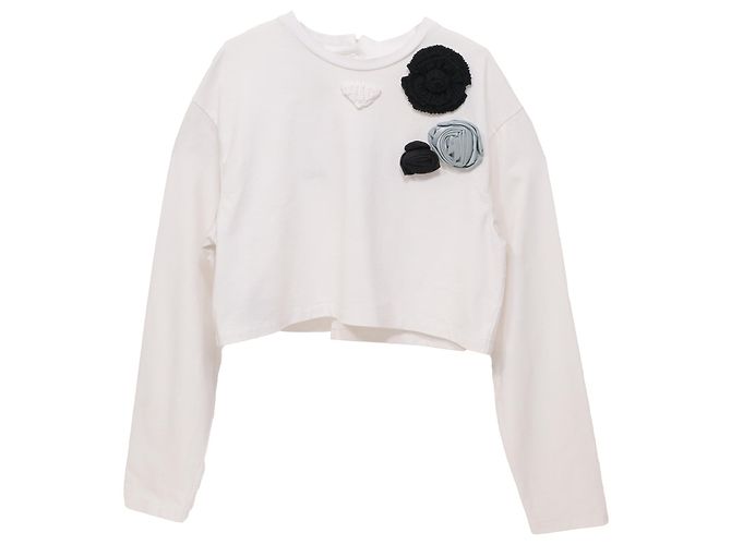 Top corto con apliques de flores de Prada en algodón blanco