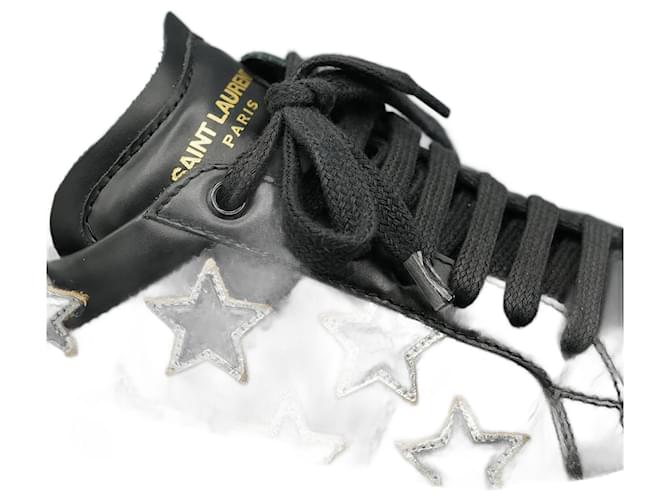 Yves Saint Laurent Deportivas Negras Planas con Estrellas Nero Pelle  ref.1345594