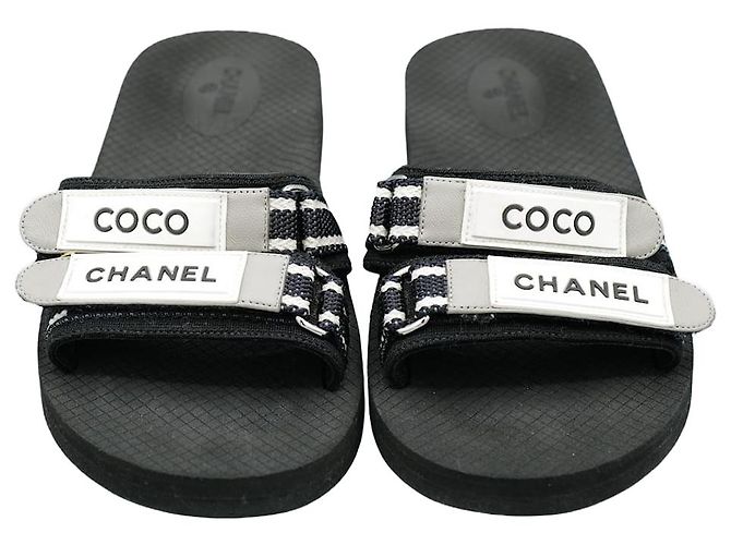 Schwarze Chanel Flip-Flops