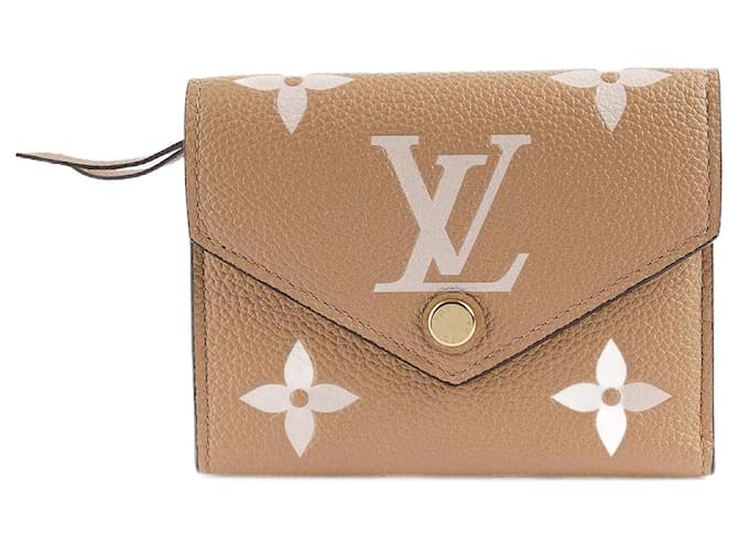 Louis Vuitton Carteira Victorine Bege Couro  ref.1345789