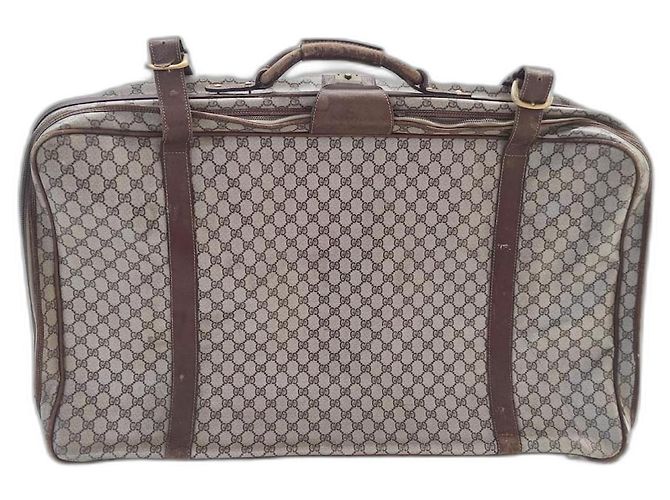 Mala Gucci de couro marrom