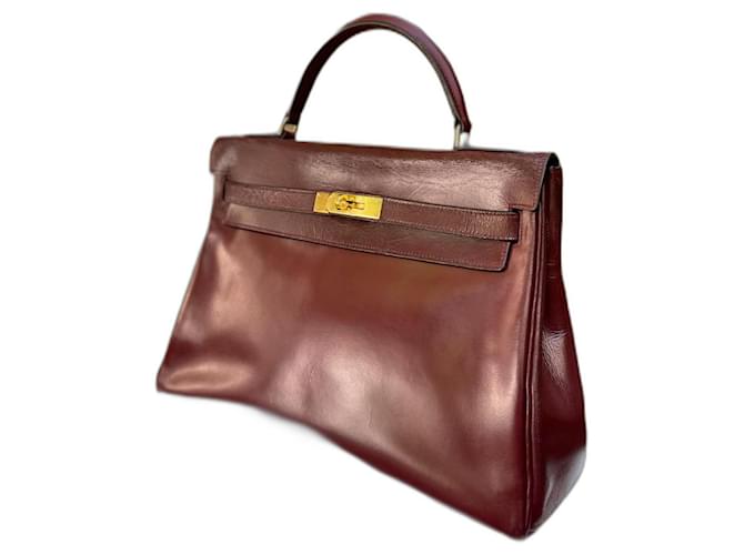 Hermès Kelly handbag 32 returned in burgundy box leather, garniture en métal doré Dark red  ref.1350152