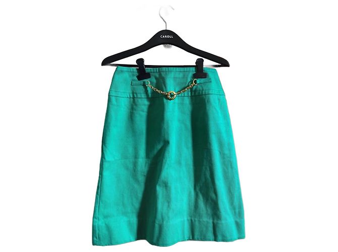 Jupe trapèze Céline en coton vert avec ceinture dorée