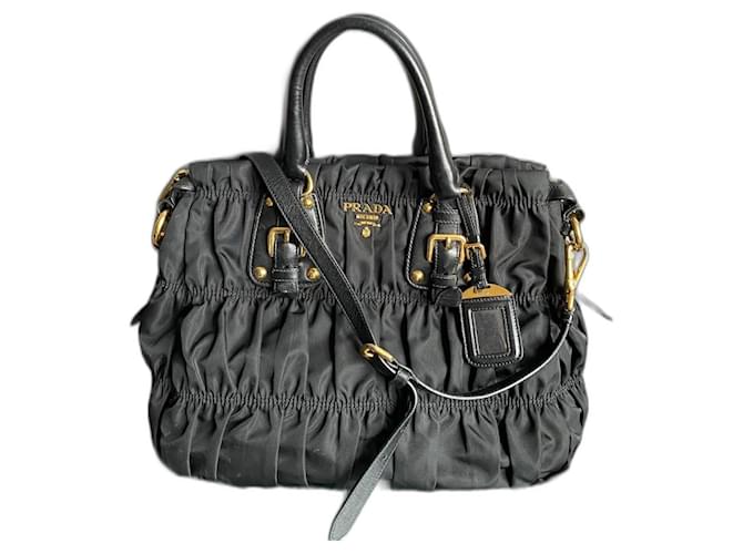 Prada Handbags Black Cloth  ref.1360213