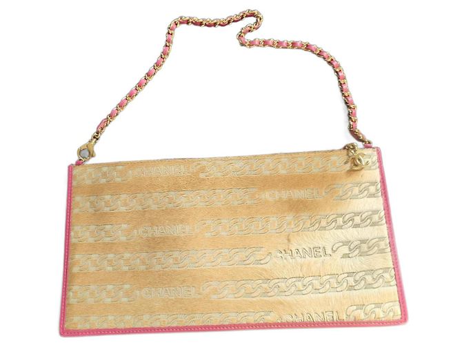 Clutch Chanel Bege em couro de cordeiro e pelos de pônei