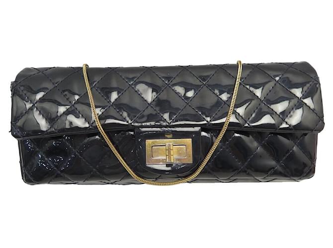 CHANEL EAST WEST BAGUETTE HANDBAG MADEMOISELLE CLASP IN LEATHER HAND BAG Black Patent leather  ref.1363049