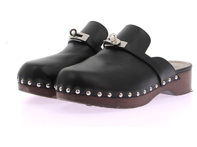 Kelly Hermès HERMES  Mules & clogs T.eu 39 leather Black
