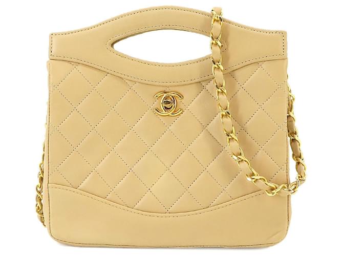 CHANEL Mini matelasse Beige Pelle  ref.1365979